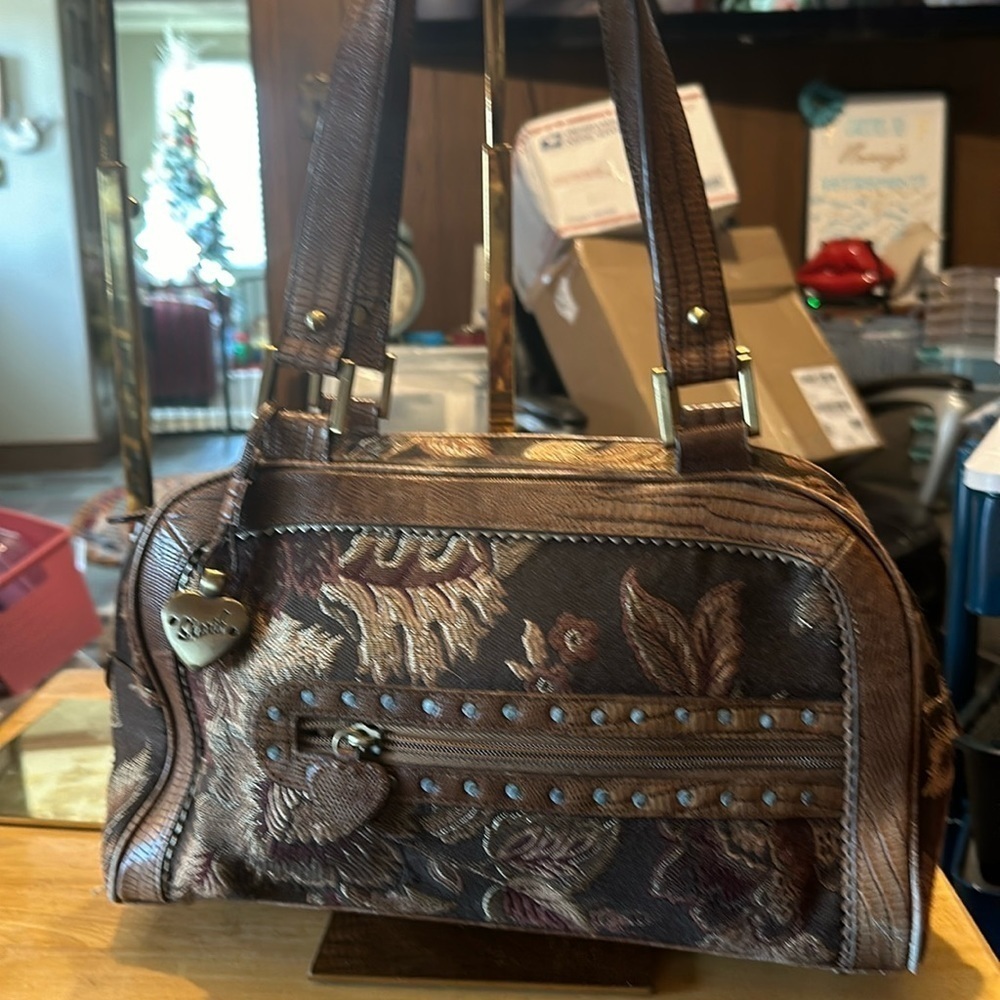 SHARIF handbag. A beautiful tapestry handbag with a golden fob on one strap.​​​